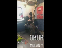 Woman with bamboo bow and arrows on her back on subway train mulan