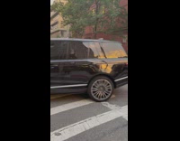 Blue SUV car with broken wheel in traffic accident at intersection