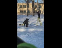 Guy black sleeves wave hands on ladder