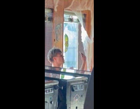 Man points and winks shop selfie video