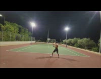 Tennis ball flies over man and hits the camera filming tennis