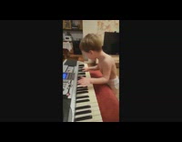 Baby screams and randomly plays keys on the piano