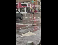 Barefoot girl jumps on yellow car rain  
