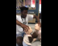 Two toy baby dolls fight kiss