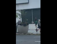 Guy rides hoverboard balances basketball on head