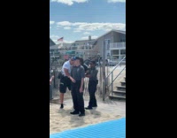 Man arrested by cops at the beach