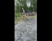 Grey shirt guy stumbles rolls down ditch 