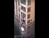 People climb down flexible ladder  