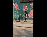 Man kneel dog head woman leather boots