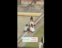 Woman white jacket black boots sexy dance park