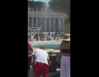 Woman in blue dress picture fountain vatican