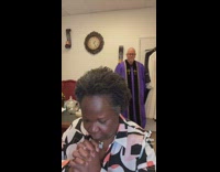 Older woman about to drop it low to dance drops to pray instead