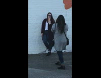 Black jacket ice cream cone white wall