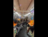 Band plays inside subway train