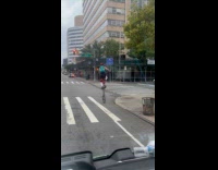 Collab WINY - Man teal backpack ride tall unicycle street part 1