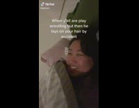 Girl in bed laughing screams