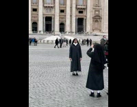 Nun sister in front of vatican church