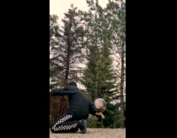 Man spins ball in finger flips and catches it with the finger