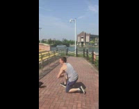 Guy attempts backflip kid looks around 