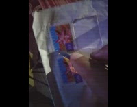 Guy rubs knife on stamp creates sparks 