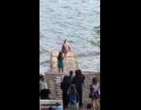 Woman in dress photoshoot with line nearby