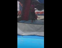 boy spins on bouncy house fail