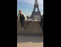 Tourist in Paris pose for photo 