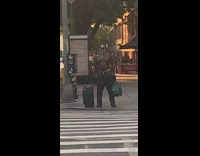 Shirtless guy clown costume mask green bag