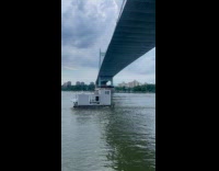 Tiny home pulled by boat for transport