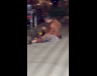 Man brown jacket grind metal street night