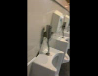 Guy approaches guy at urinal 