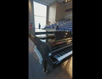 Concert hall top of skyscraper black piano 