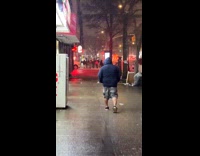 Man wears shorts on cold winter night