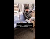 Man wipes off subway seat with water part 1Man wipes off subway seat with water part 2