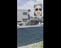 Man shows van burned at parking lot