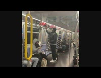 Collab Subway Creatures - Man rips off advertisement sign off subway wall and reads it like a newspaper