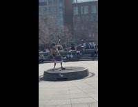 Guy in empty fountain twirls stick pt. 2