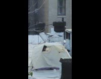 Guy sits on rooftop with tent 
Part 2 