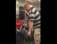Guy grey and blue striped shirt polo falling asleep standing up holding onto pole subway train