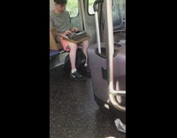 Guy types on typewriter on the subway train