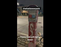 Old fire and police alarm pole on street