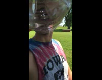 Man flicking tongue while drinking 