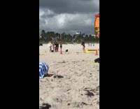 Women films woman bikini run at beach
