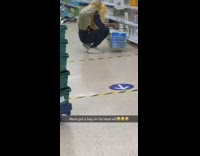 Guy at grocery store wears plastic bag 