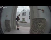 Woman hair flip front porch ring camera