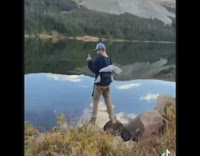 Baby leaning back in backpack carried by dad 