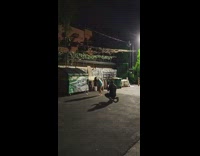 Girl poses with baby Yoda dumpster 