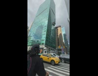 Guy catches woman who trips on sidewalk 