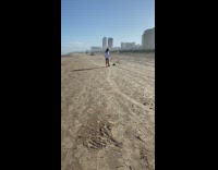Woman white shirt footwork dance beach sunny