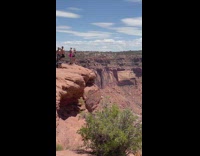 Shirtless guys and girls flex muscles cliff part 2